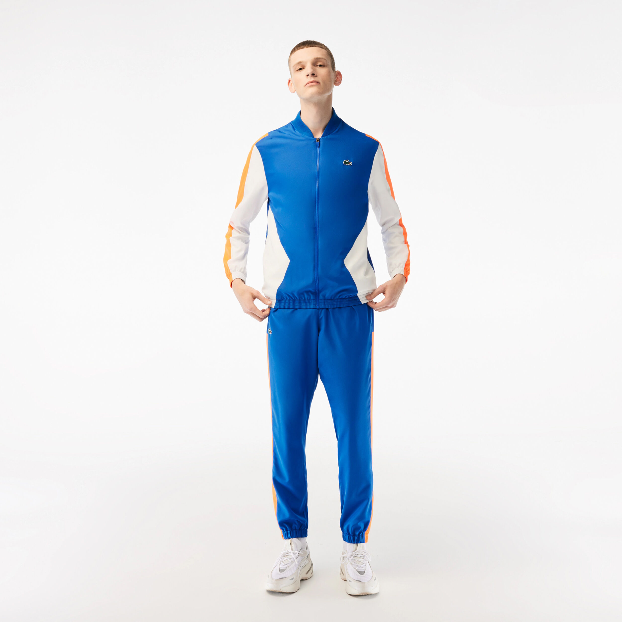 Survetement lacoste bleu orange cheap