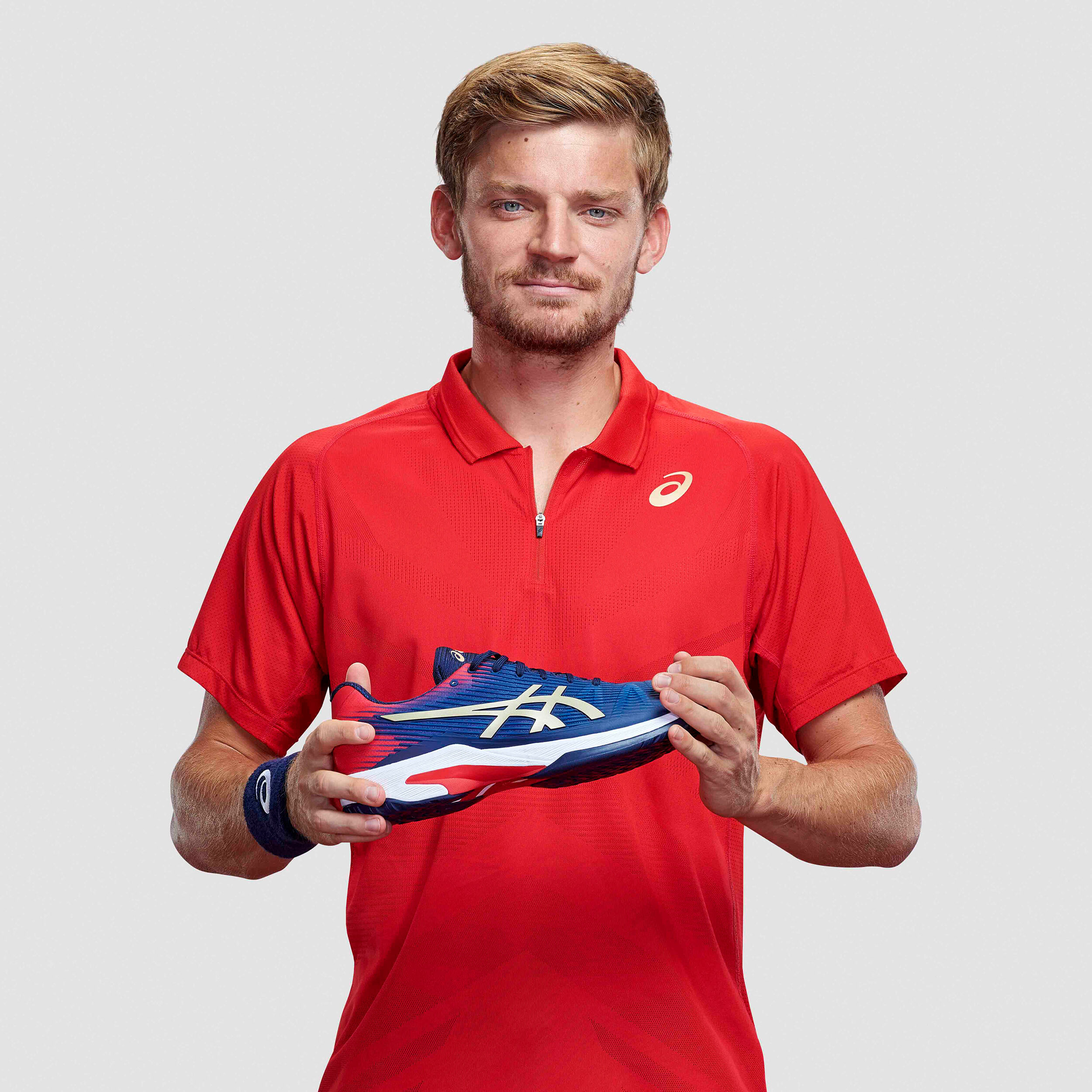 Polo asics 2025 rouge